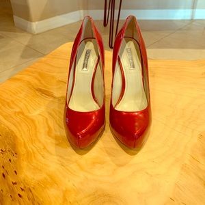 BCBG Candy Apple Red Stilleto pumps.